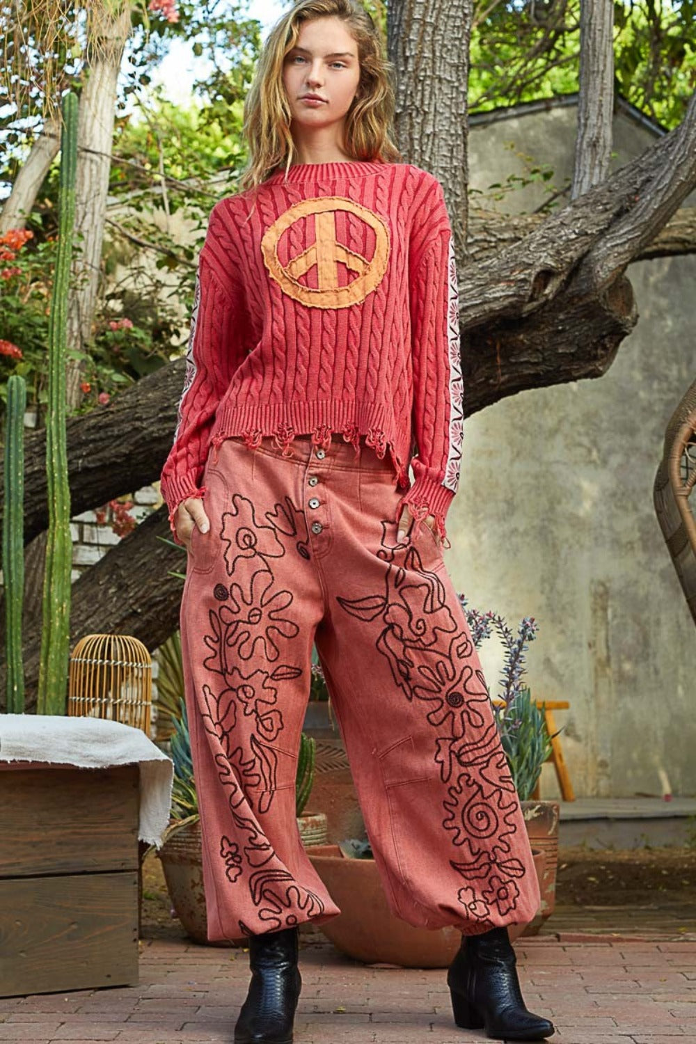 Suéter de punto trenzado con parche de paz lavado POL